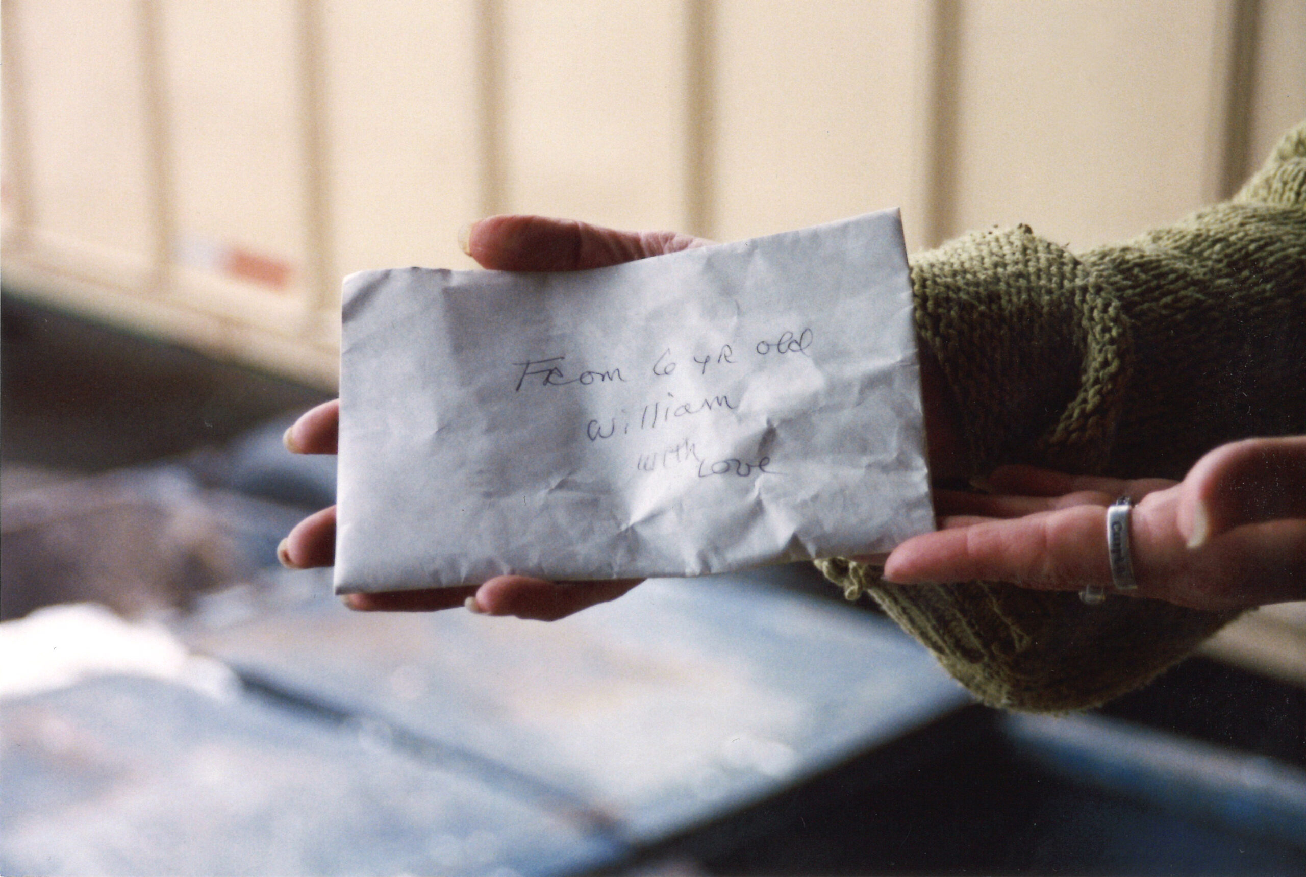 Food Donation - Fighting Hunger - Hand Holding Envelope